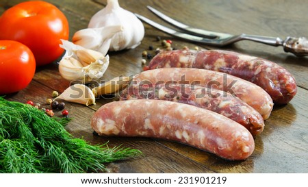 homemade raw sausages - chicken and beef sausages with garlic and spices