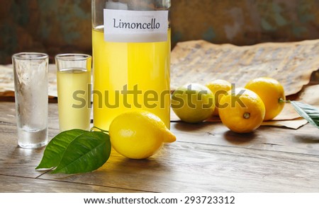 Italian alcoholic beverage, Limoncello on wooden table
