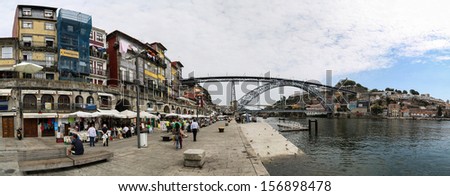 PORTO, PORTUGAL - SEPTEMBER 5: Unidentified people on the street of Porto, Portugal at September 5, 2013. Historic Centre of Porto is a UNESCO World Heritage Site since 1996.