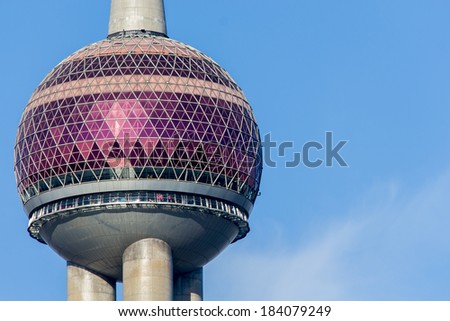 SHANGHAI, CHINA - JANUARY 24, 2014: View at Oriental Pearl TV tower in Shanghai. Tower is opened at 1994 and have height of 468 m.