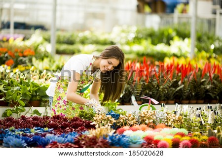 Young woman in flower garden