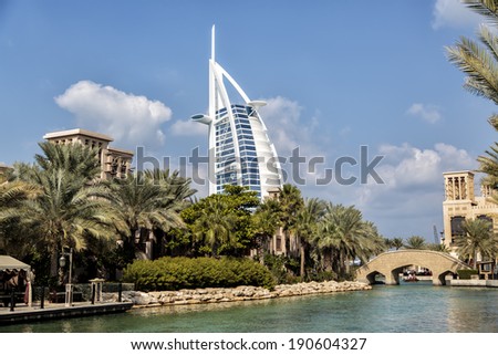 DUBAI, UAE - JANUARY 16, 2014: View of hotel Burj al Arab from Madinat Jumeirah in Dubai. At 321 m, it is the fourth tallest hotel in the world and has 202 rooms.