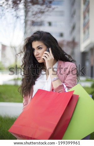 Pretty young woman in shopping