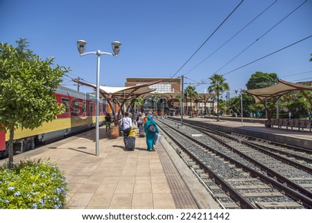 MARRAKESH, MOROCCO - SEPTEMBER 11, 2014: Unidentified people on train station in Marrakesh, Morocco. Train station was opened at 2008 and now is southern end-point of the Moroccan railway system.