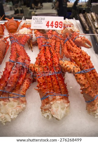SYDNEY, AUSTRALIA - APRIL 9, 2015: King crab legsr on the Sydney Fish Market. 52 tonnes of seafood are selling at auction on this market every day.