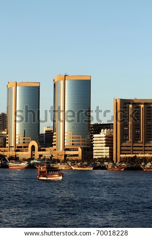 DUBAI, UAE - NOVEMBER 18: Deira Twin Towers in Dubai Creek November 18, 2010. Twin Towers are constructed in 1998 and height of each building is 102m.