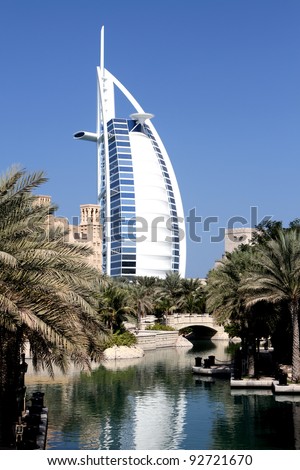 DUBAI, UAE - NOV. 15: View at hotel Burj al Arab from Madinat Jumeirah in Dubai at November 15, 2010. Madinat Jumeirah encompasses two hotels and clusters of 29 traditional Arabic houses.