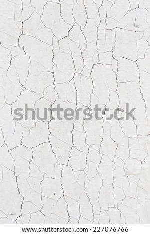 cracked paint on a cement wall to be used as a background