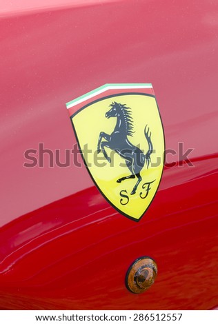 Close up of a Ferrari car badge, Essex classic car show. 17/05/2015