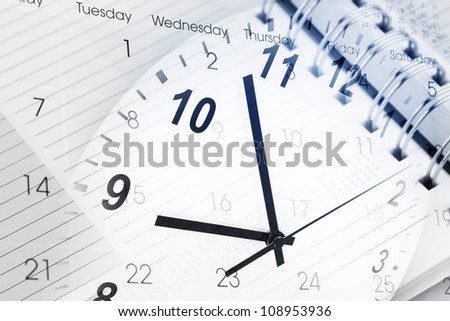 Clock face, calendar and diary page