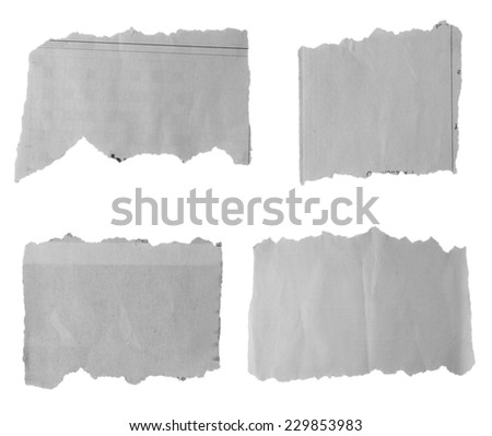 Four pieces of torn paper on plain background