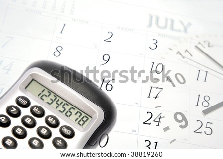 Calculator, clock hands and July calendar