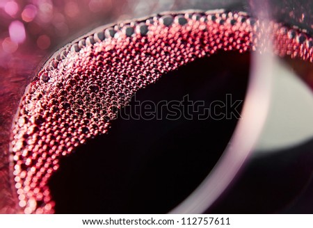 Red wine in wineglass ,focus on a center