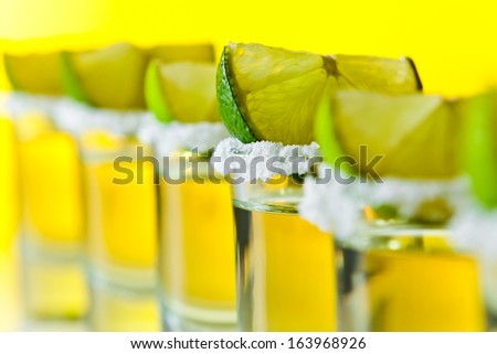 tequila , lime and salt , macro shot , focus on foreground