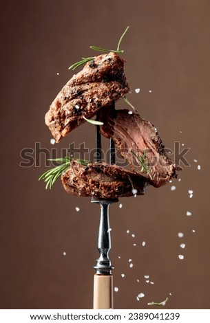 Similar – Foto Bild Steak auf einer Gabel