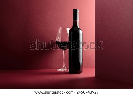 Similar – Image, Stock Photo Wine bottle and glass by candlelight Outdoor at the Maximilianeum