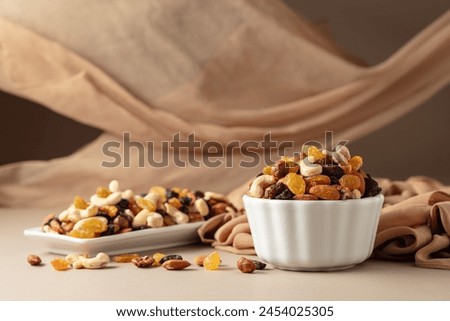 Similar – Image, Stock Photo Variation of nuts in a bowl on a beige linen tablecloth. Top view.