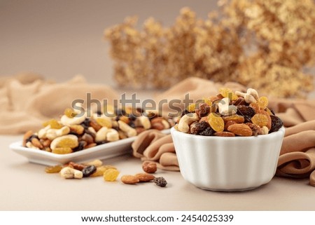 Similar – Image, Stock Photo Variation of nuts in a bowl on a beige linen tablecloth. Top view.