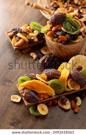 Similar – Image, Stock Photo Variation of nuts in a bowl on a beige linen tablecloth. Top view.