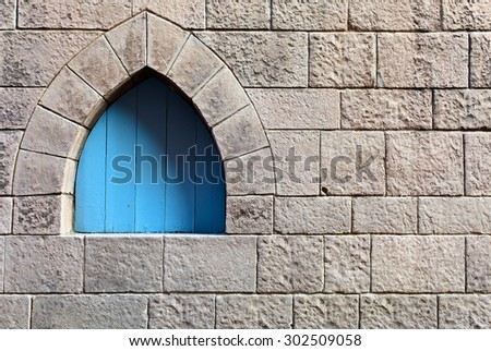 window in stone wall , the middle ages , Spain