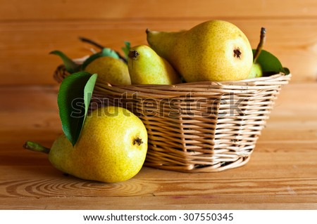 Juicy ripe pears on a wooden table