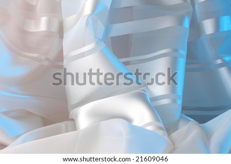 white textile in blue light