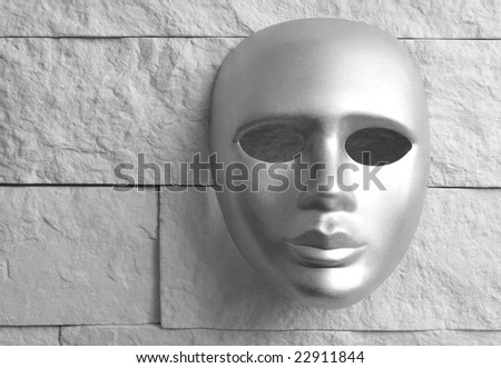 metal mask on a wall