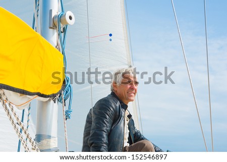 Image of handsome man on yacht