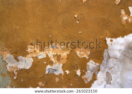 Grunge texture of the old and damaged stucco - plaster