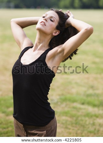 Young woman in a black tank-top