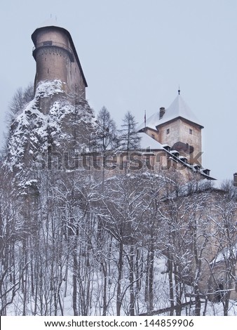 Rare winter view of famous Orava Castle in after strong snow storm. Orava Castle is considered to be one of the most beautiful castles in Slovak Repubic.