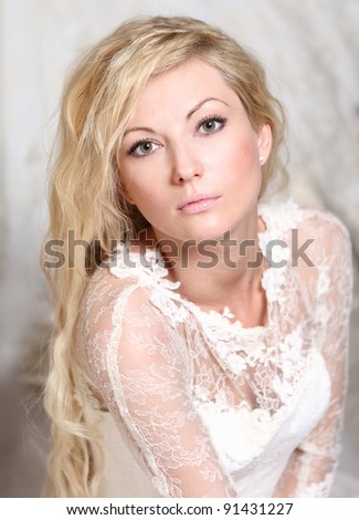 portrait of a bride with blond curly hair