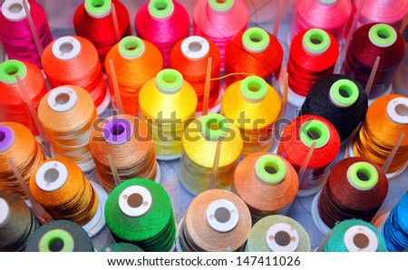 colorful sewing threads good for backgrounds and scrap-booking/Rainbow Colored Thread