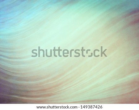 A water abstraction with cross-processed colors.  Image displays a pleasing grain pattern at 100 percent.
