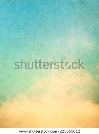 Yellow clouds and fog on a vintage, textured background with a subtle color gradient.  Image displays significant paper grain and texture at 100 percent.