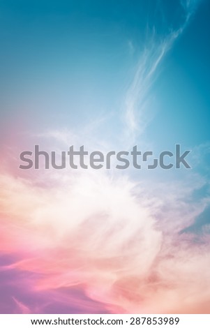An abstract cloud background with a multicolored gradient.