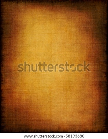 An old section of cloth and paper with a golden center and vignette effect.