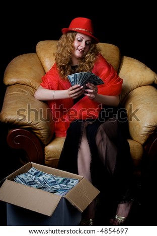 A series of photos ii? the woman and money.