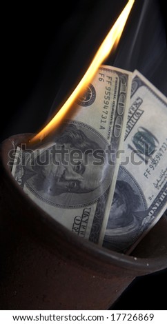 Burning of money on fire