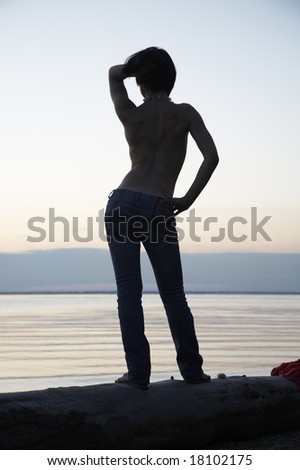 Woman is standing her back to people