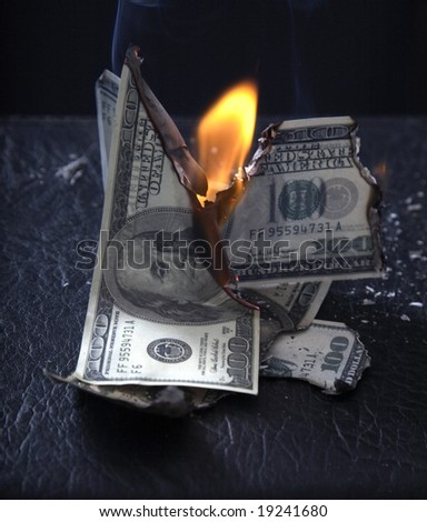 Burning of money on fire