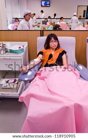 BANGKOK, THAILAND - NOVEMBER 03: Thai Red Cross Institution gathers people from all over the country to donate blood due to national blood shortage situation on November 3, 2012 in Bangkok, Thailand.