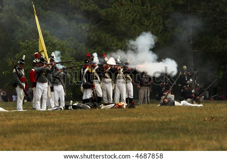 American soldiers shooting during a War of 1812 battle re-enactment