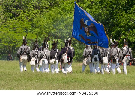 STONEY CREEK, ONTARIO, CANADA - JUNE 6 : American infantry marching into battle during a War of 1812 re-enactment at Stoney Creek Ontario Canada, June 6, 2011