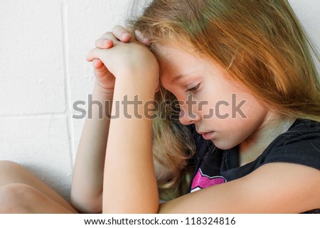 Sad Little Girl Sitting Near The Wall Stock Photo 118324816 : Shutterstock