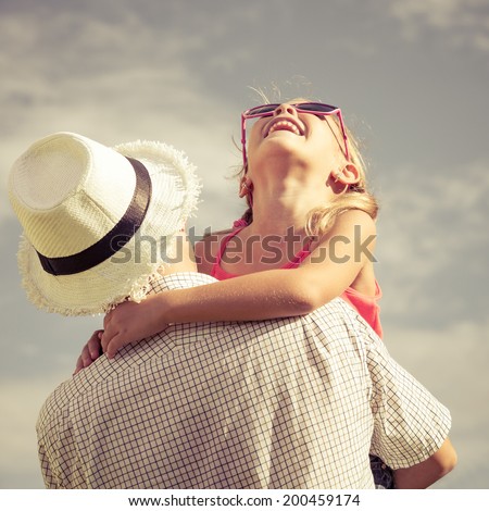 Similar – Image, Stock Photo Joyful couple on playground against grassy field