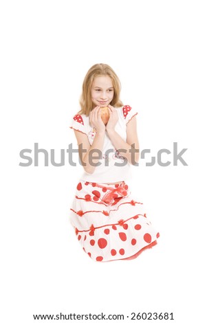 Little girl holding a big red apple (isolated on white)