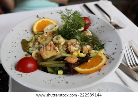 Plate of seafood salad in the fish restaurant