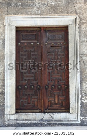 Old wooden arabic door of a building in Istanbul, Turkey