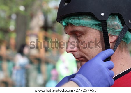 Profile man face in the black helmet